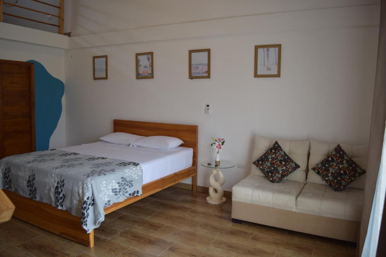 Ohana Beach Hotel Playas Bagian luar foto
